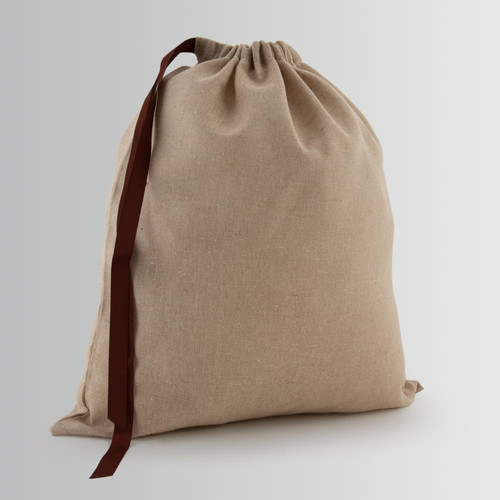 Cotton bag with drawstring closure and single attachment with ribbon